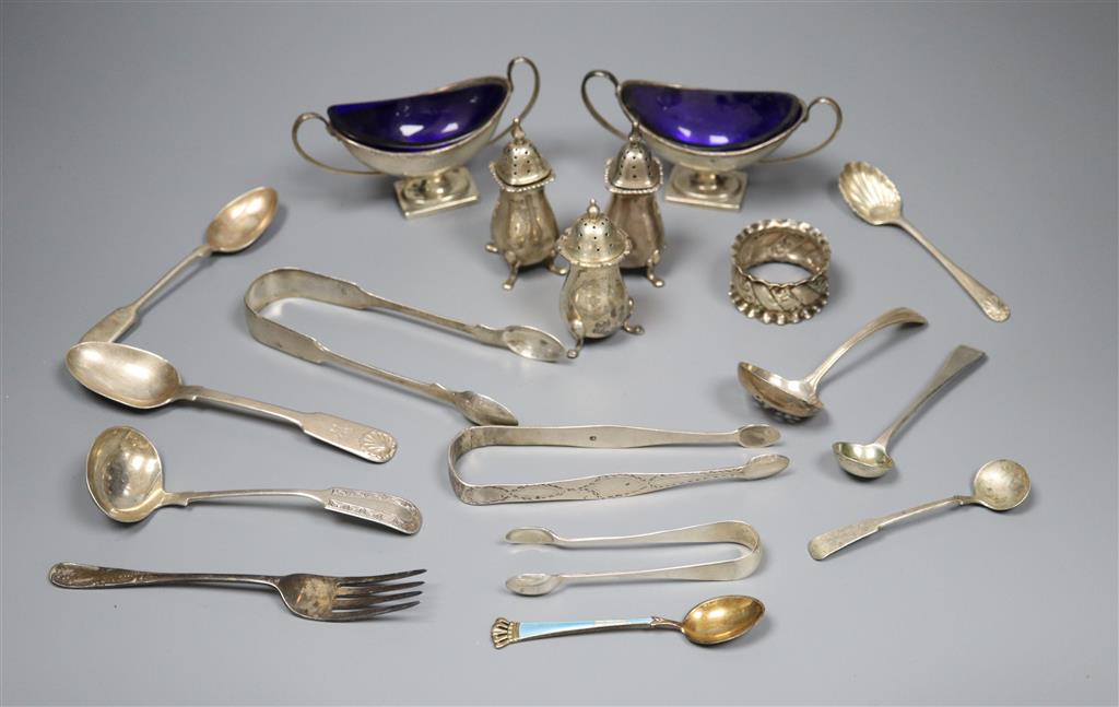 A pair of Edwardian silver boat shaped salts, three silver pepperettes and a small group of silver and plated flatware,